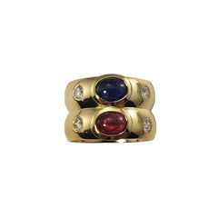 Bague en or jaune 18 carats, rubis naturel, saphir et diamants