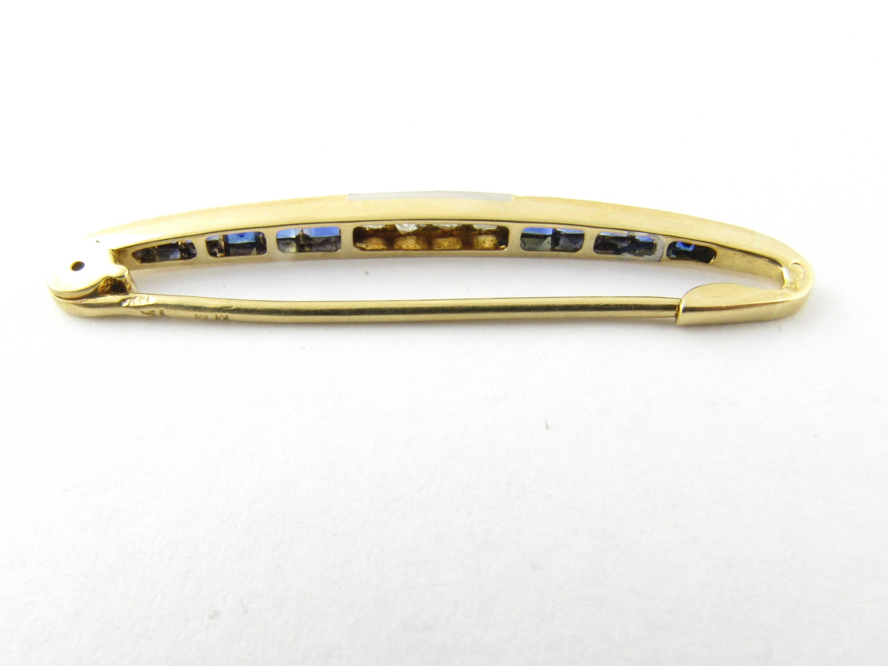 Vintage 18 Karat Yellow Gold Sapphire and Diamond Brooch-

This exquisite brooch features 12 square cut graduated diamonds and four rose cut diamonds set in lovely 18K yellow gold.

Approximate total diamond weight: .10 ct.

Diamond clarity: