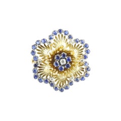 18 Karat Yellow Gold Sapphire and Diamond Flower Brooch