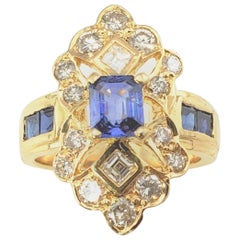 18 Karat Yellow Gold Sapphire and Diamond Ring 18 Karat Yellow Gold Sapphire and Diamond Ring