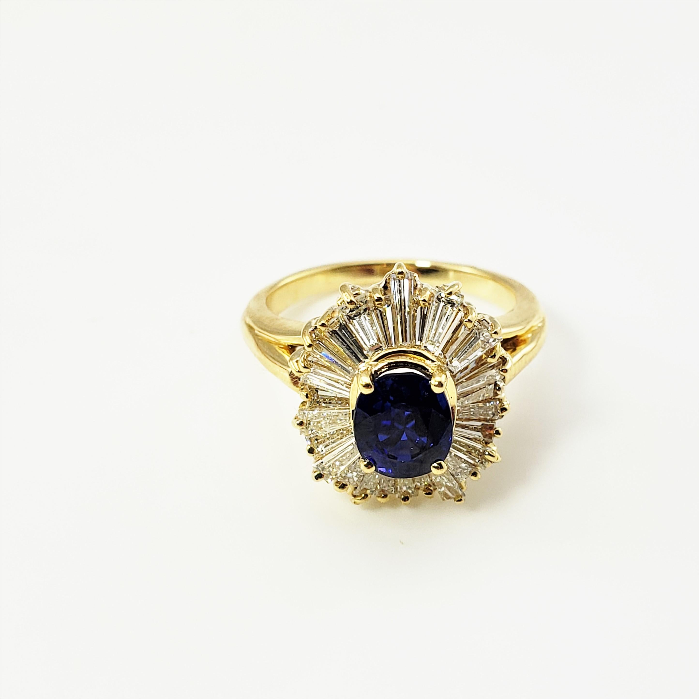 18 Karat Yellow Gold Sapphire and Diamond Ring Size 6 GAI Certified-

This stunning ring features one oval sapphire and 28 baguette diamonds set in classic 18K yellow gold.  Top of ring measures 15 mm x 13 mm.  Shank measures 1.5 mm.

Sapphire