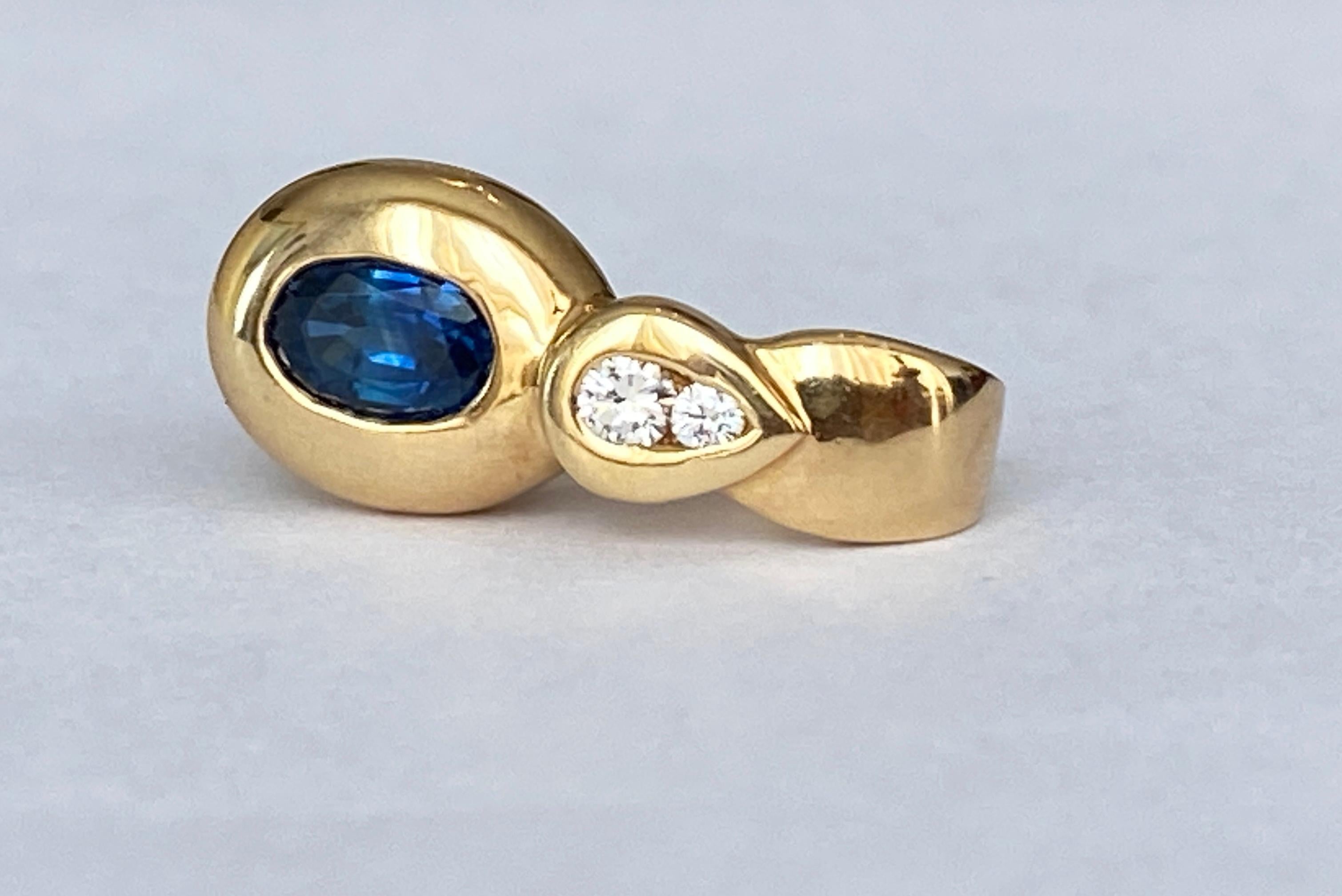 Contemporary 18 karat yellow gold  sapphire clip pendant with diamonds