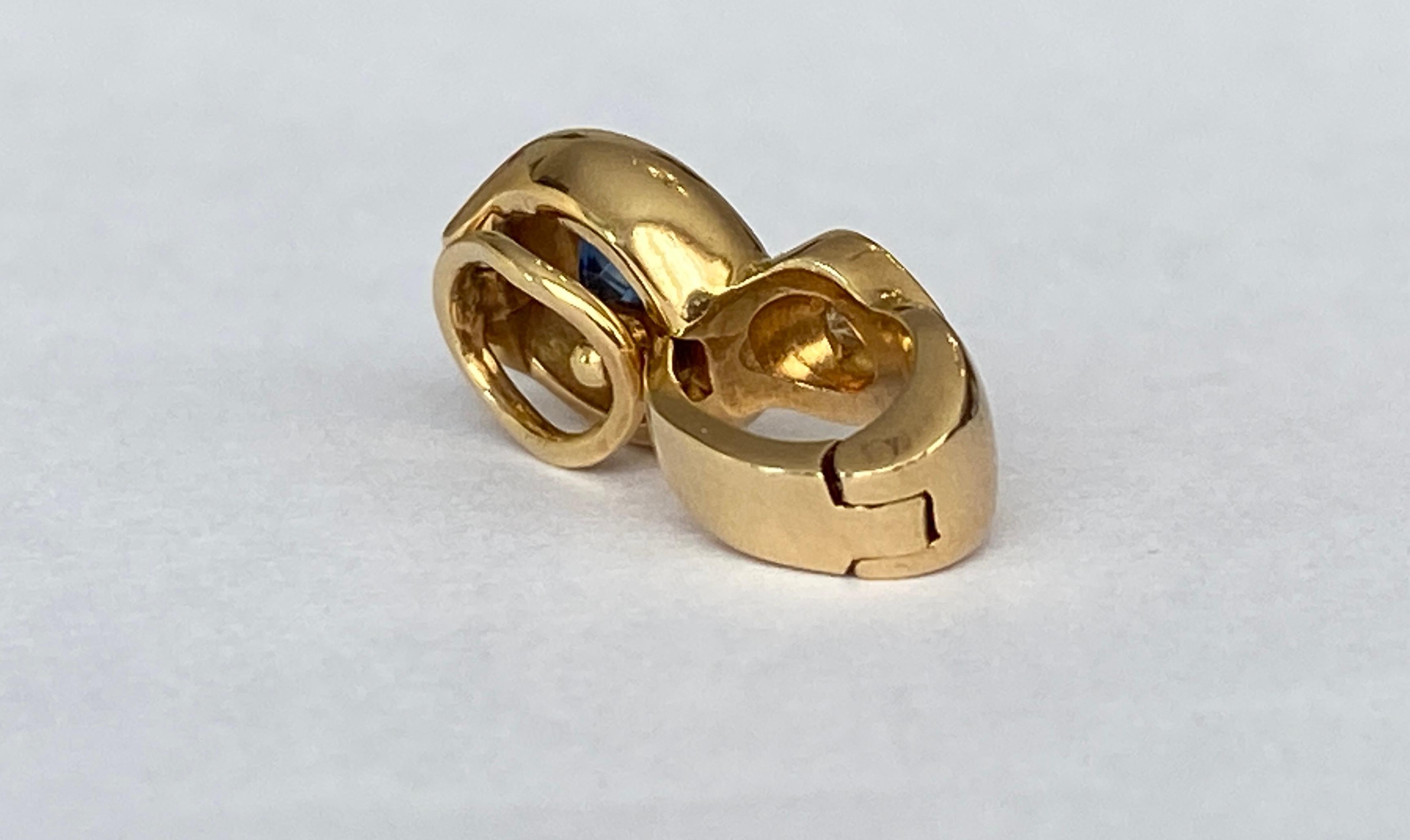 Brilliant Cut 18 karat yellow gold  sapphire clip pendant with diamonds