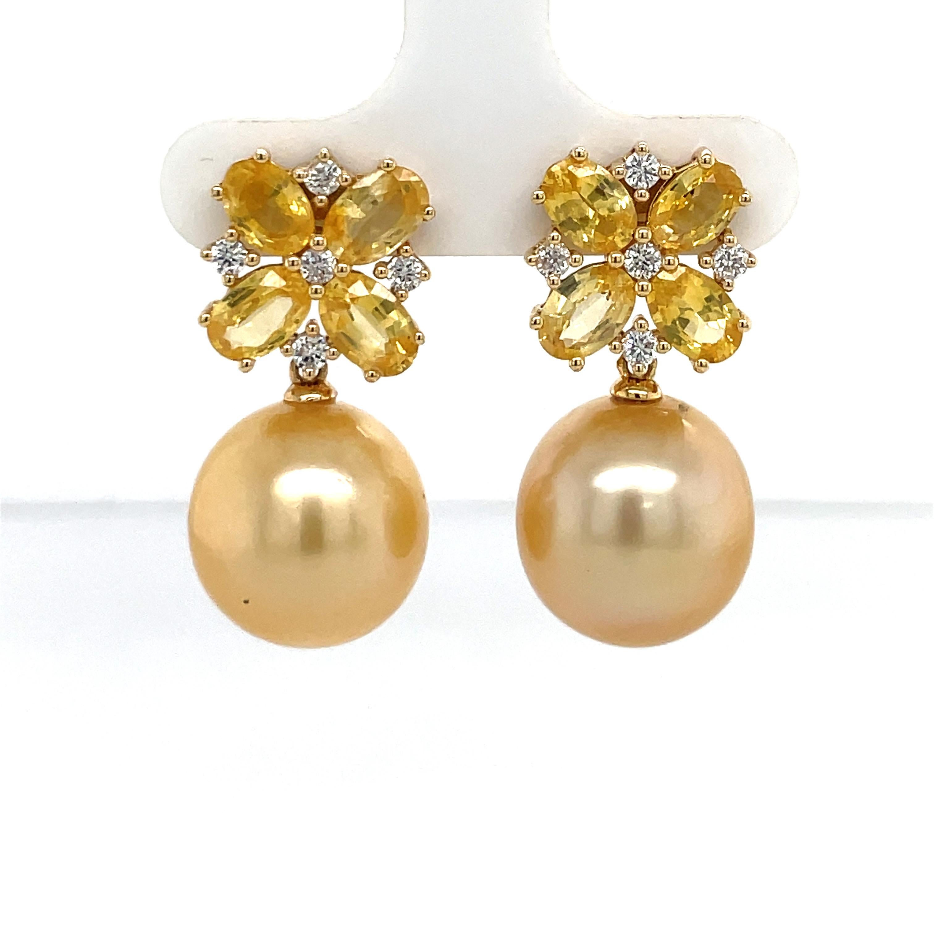 18 Karat Yellow Gold drop earrings featuring 8 Oval shape Sapphires weighing 4.68 Carats with 10 diamonds, 0.34 Carats, and two Golden South Sea Pearls measuring 13-14 MM. 
Can customize Pearl color & size.
DM for more information. 