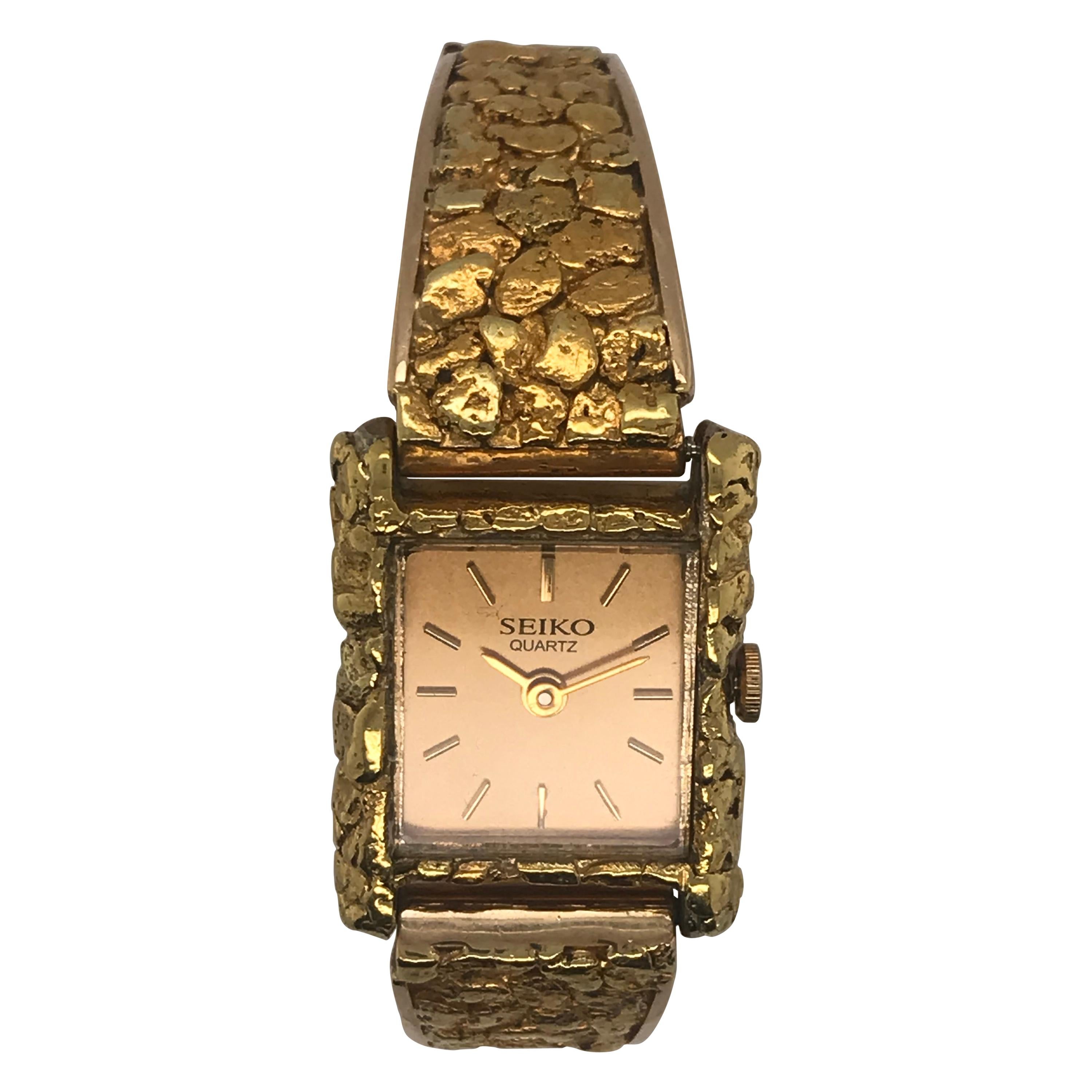 18 Karat Yellow Gold Seiko Quartz Watch For Sale