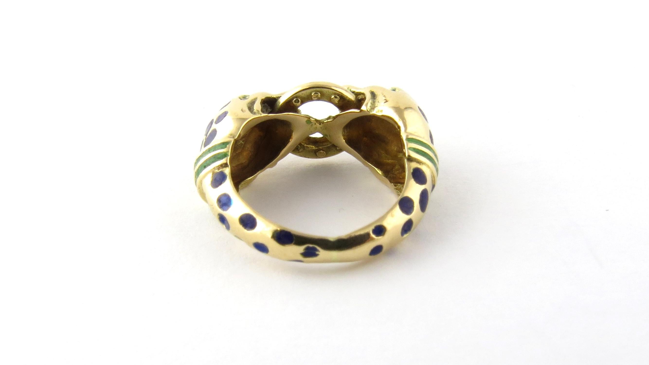 Vintage 18 Karat Yellow Gold Serpent Ring Size 3

This elegant serpent ring is accented with green enamel and crafted in classic 18K yellow gold. 
Width: 10 mm. Shank: 3 mm.

Ring Size: 3

Weight: 5.5 dwt. / 8.6 gr.

Acid tested for 18K gold.

Very