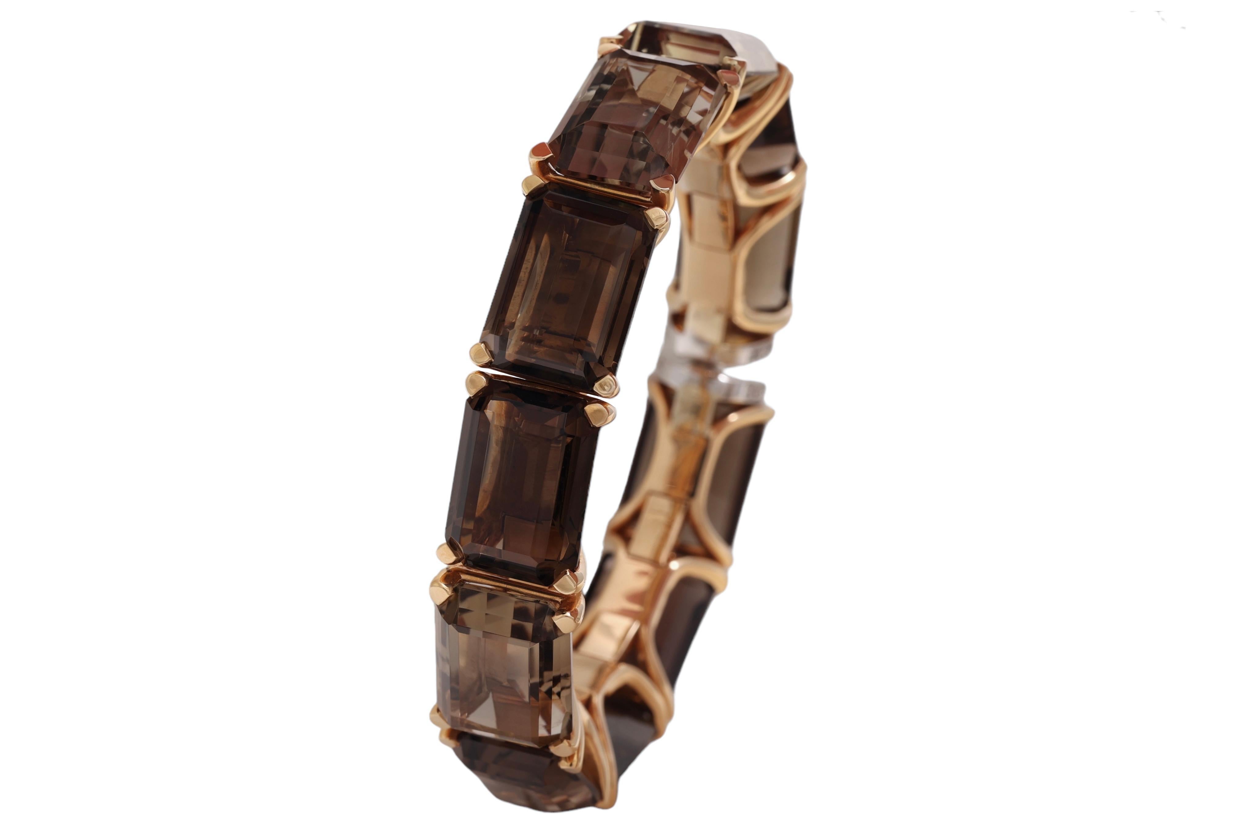 Stunning, Gigantic 18kt. Yellow gold Set Necklace Earrings, Bracelet With Smoky Quartz, Diamonds 

Bracelet:
11 Smoky Quartz Stones
Diamonds: Brilliant cut together 0,24 ct.
Material: 18 kt. yellow gold
Total weight: 87.0 gram / 3.070 oz / 56.0