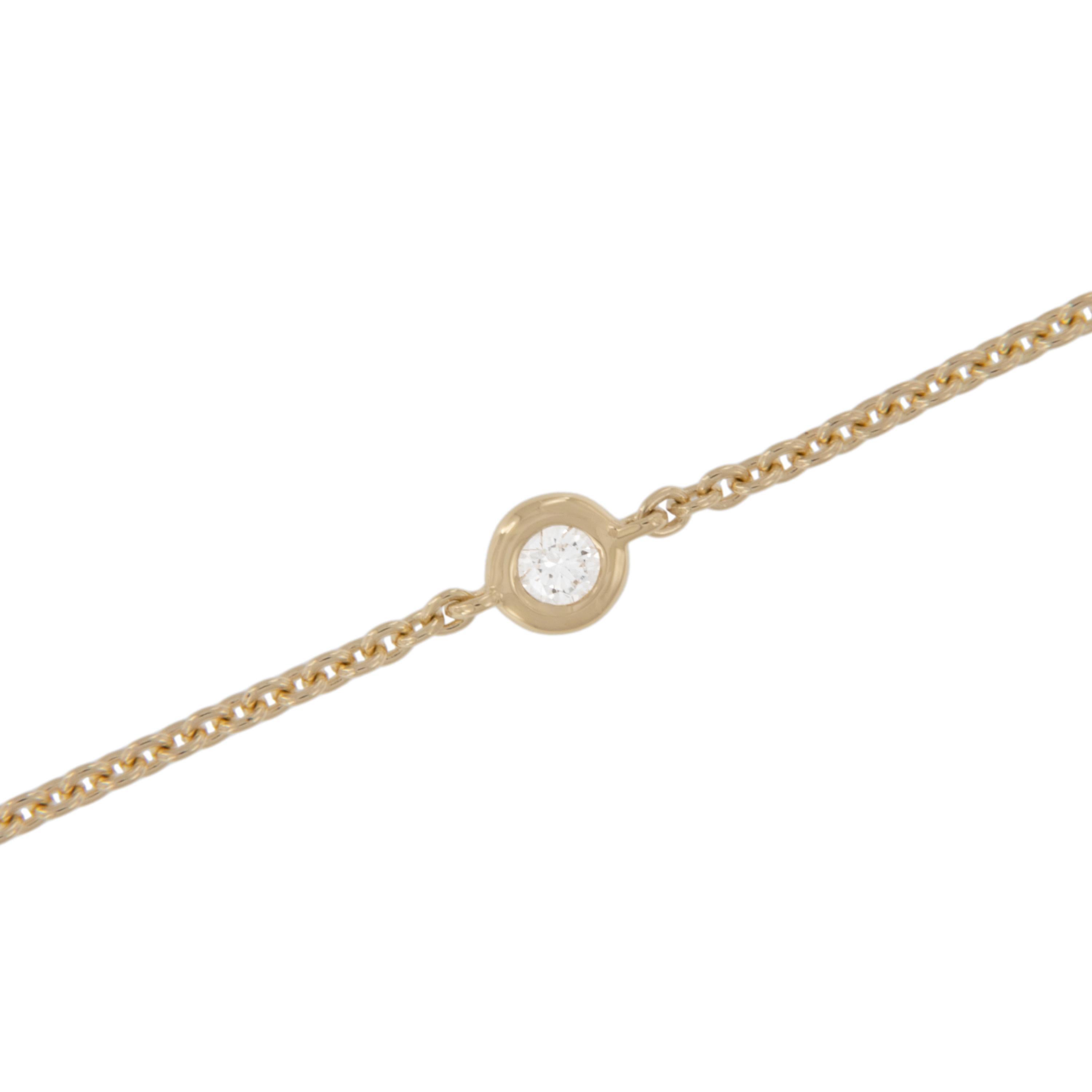 Rich 18 karat yellow gold with six fine quality diamonds = 0.37 Cttw (VS clarity, G-H color) this station necklace stands the test of time! You can wear every day with jeans and a t-shirt and looks fabulous with other necklaces for a stylish layered