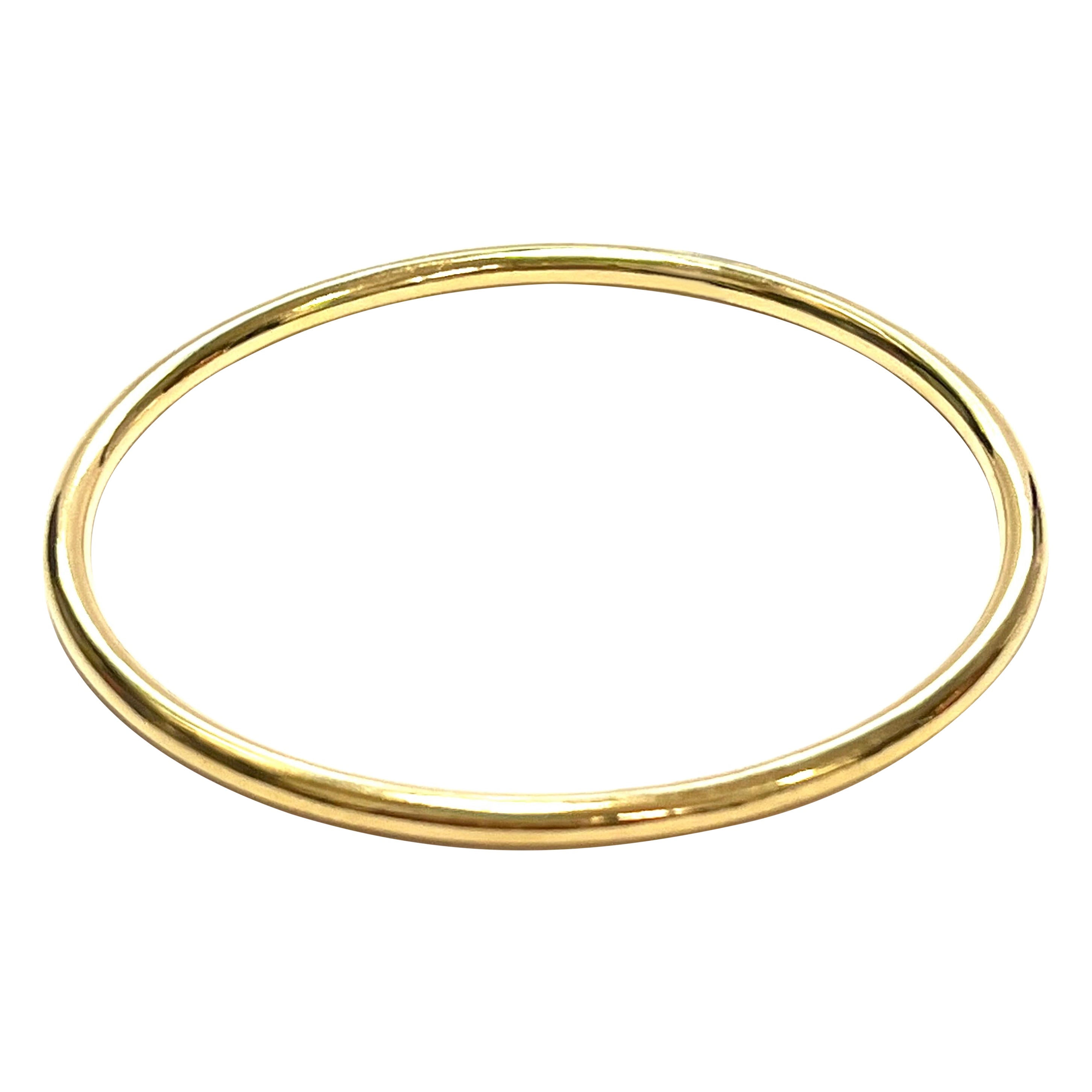 18 Karat Yellow Gold Slim Bangle from the "Essence" Collection For Sale
