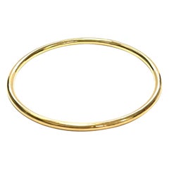 18 Karat Yellow Gold Slim Bangle from the "Essence" Collection
