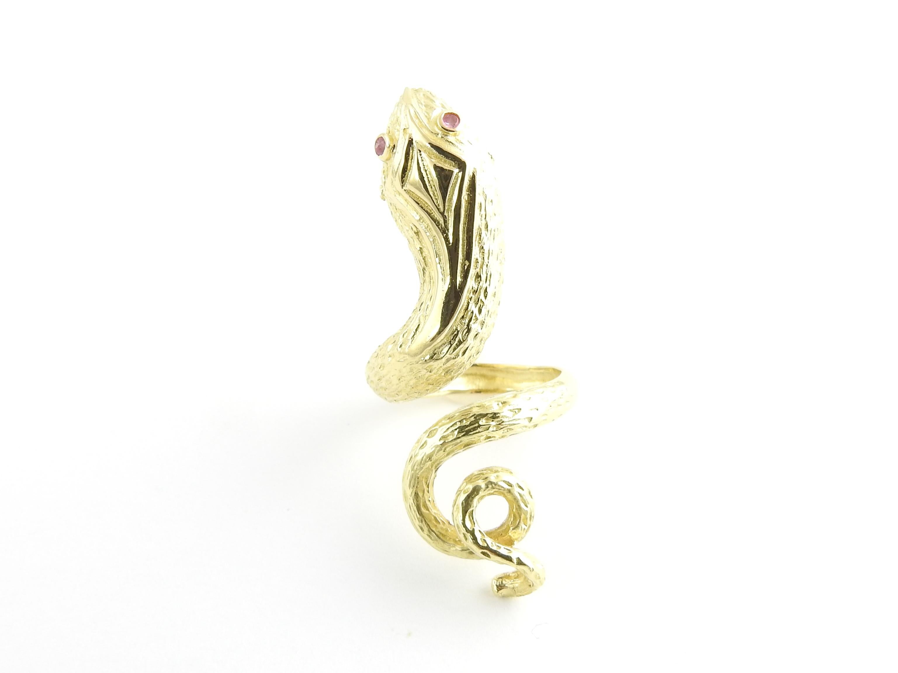 Vintage 18 Karat Yellow Gold Snake Ring Size 4.75

This elegant ring is crafted in beautifully detailed 18K yellow gold in a dramatic snake design. Accented with two ruby eyes. Width: 45 mm.

Shank: 3 mm.

Ring Size: 4.75

Weight: 7.8 dwt. / 12.2