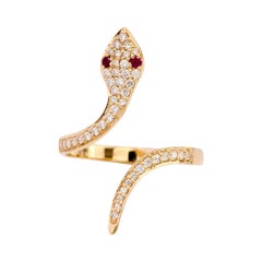 Bague serpent en or jaune 18 carats, diamants et rubis