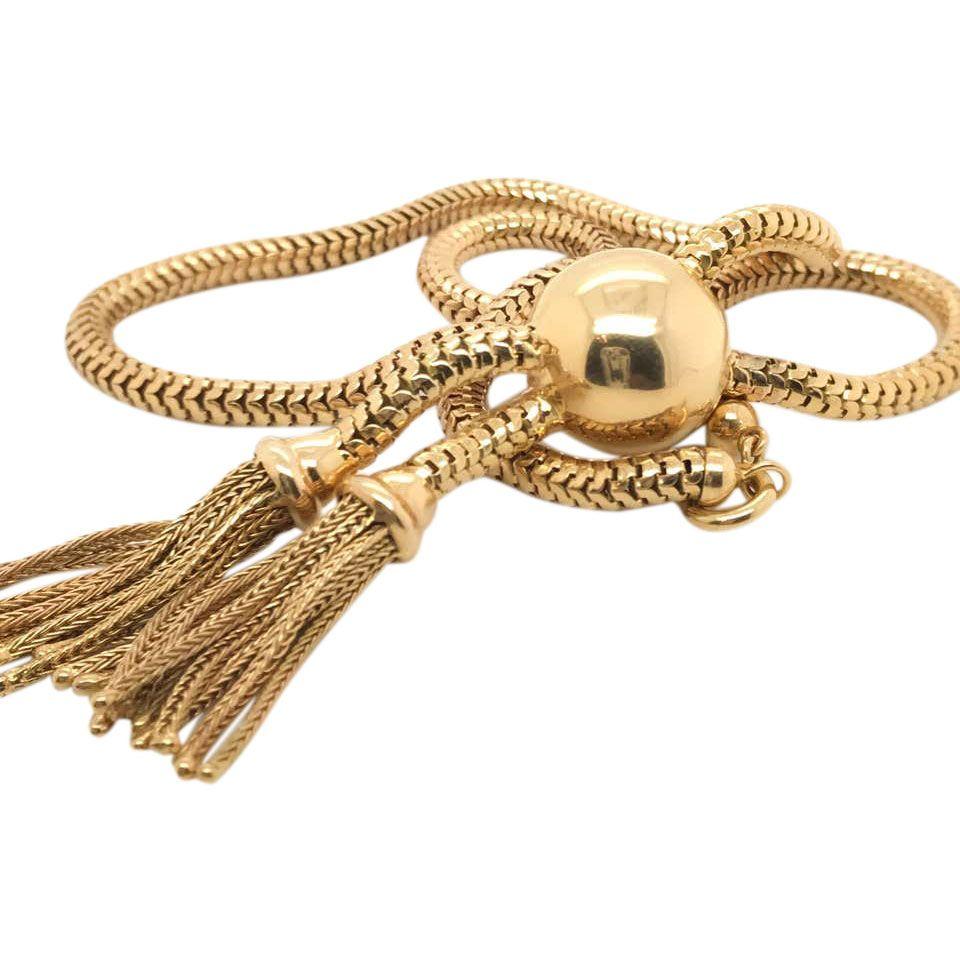 A super cool Retro piece, I just love this style it's chic and so wearable. Featuring a finely detailed 18k yellow gold snake chain that sits perfectly on the neckline that drops 8.50 inches / 21 cm. The high polish ball sits at the middle and then