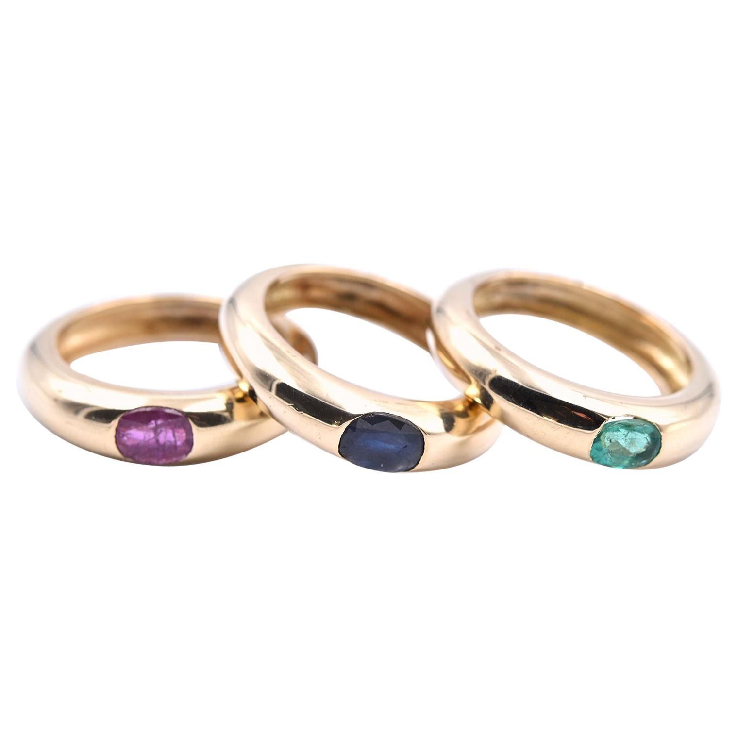 18 Karat Yellow Gold Stackable Emerald, Ruby, and Sapphire Band Set