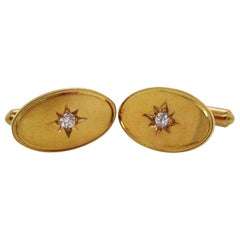 18 Karat Yellow Gold Star Set Diamond Oval Cufflinks