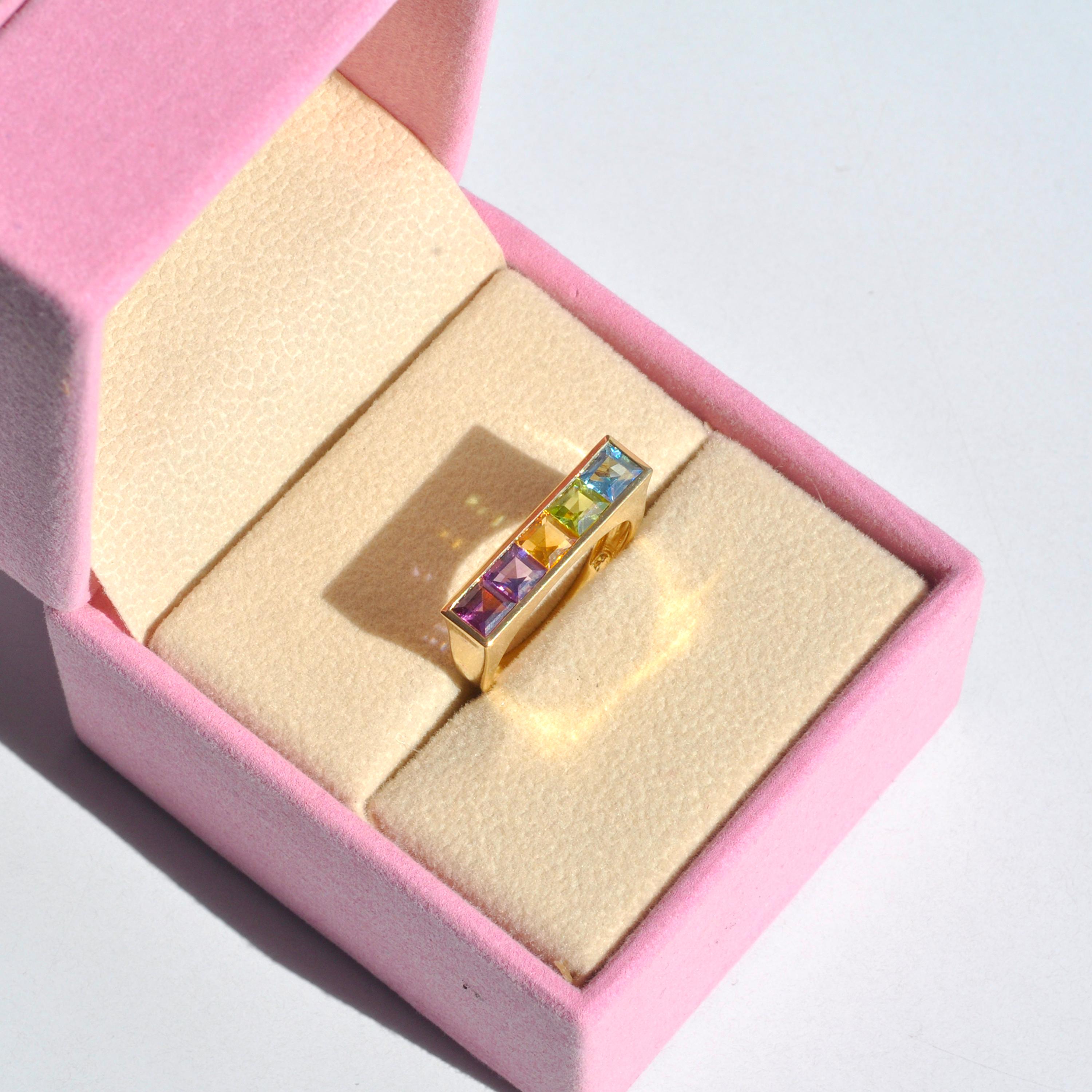 For Sale:  18 Karat Yellow Gold Step Cut Multicolour Gemstones Linear Rainbow Bar Band Ring 10
