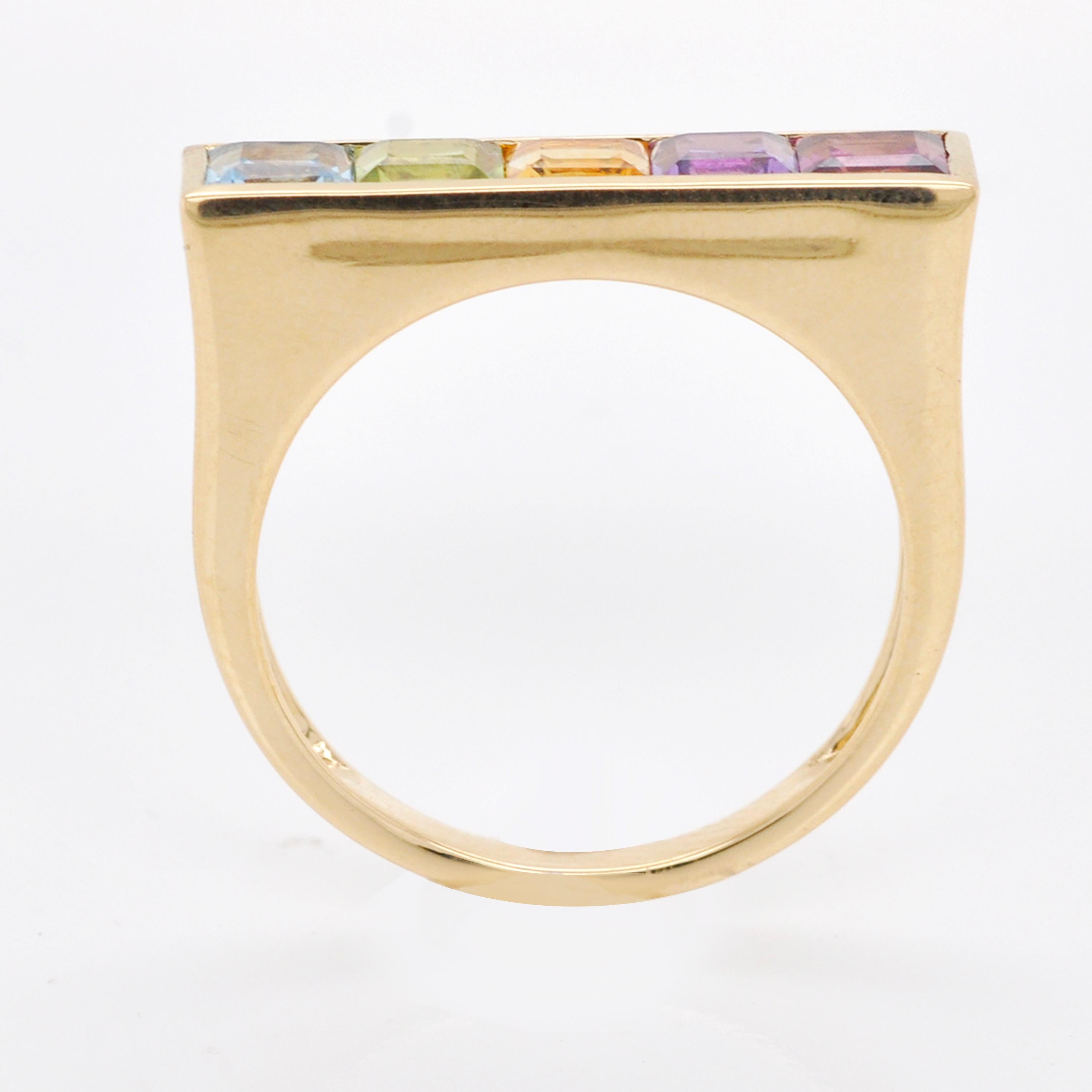 For Sale:  18 Karat Yellow Gold Step Cut Multicolour Gemstones Linear Rainbow Bar Band Ring 7