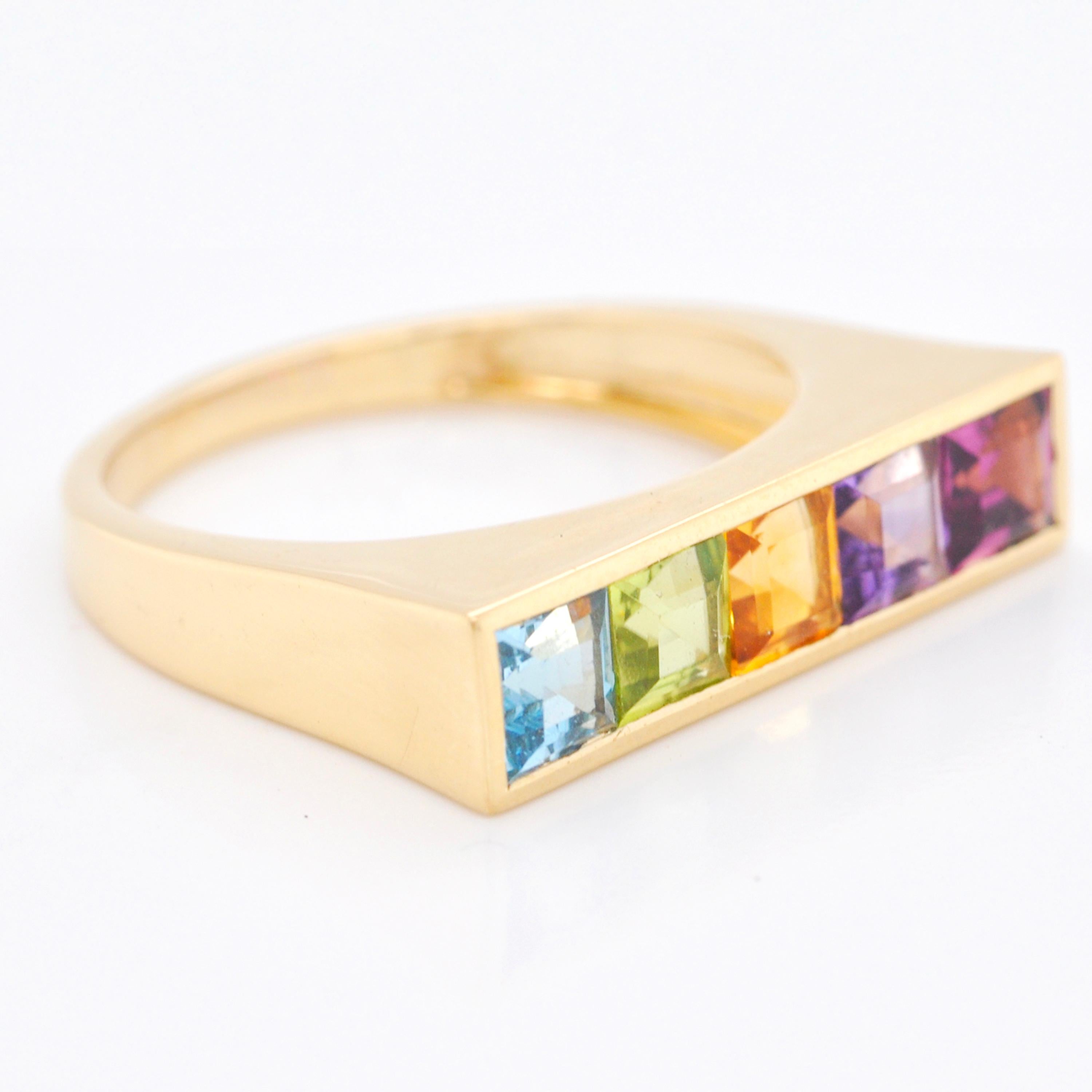 For Sale:  18 Karat Yellow Gold Step Cut Multicolour Gemstones Linear Rainbow Bar Band Ring 9