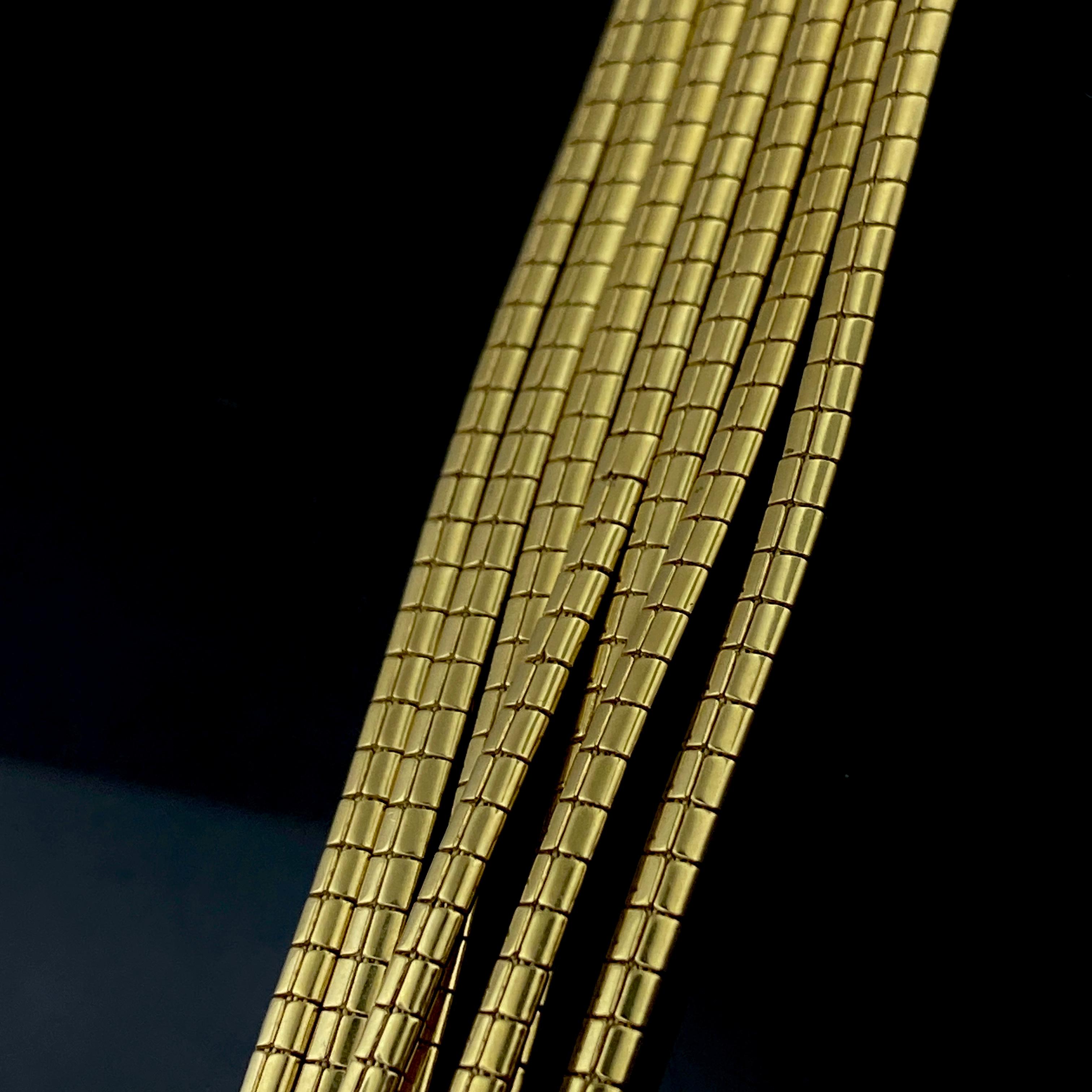 18 Karat Yellow Gold Strand Bracelet In Good Condition For Sale In Palm Desert, CA