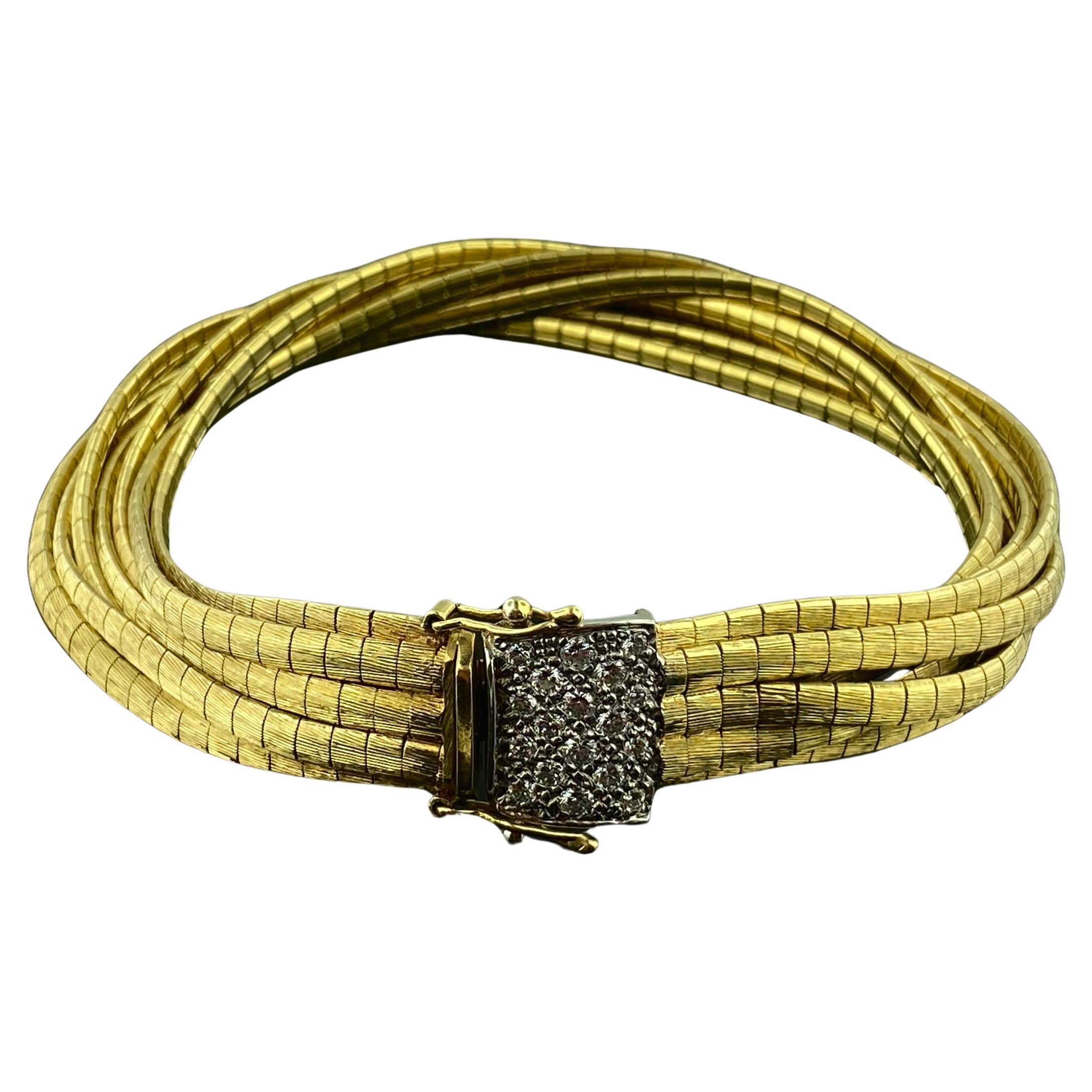 18 Karat Yellow Gold Strand Bracelet For Sale