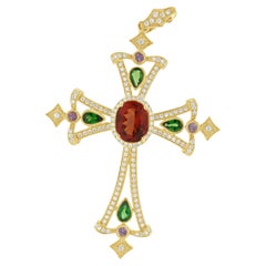 18 Karat Yellow Gold Sunstone, Diamond, Sapphire, and Tsavorite Cross Pendant