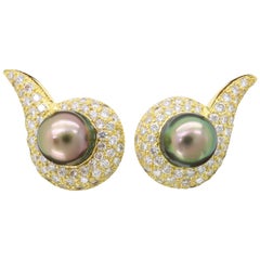 Boucles d'oreilles dos oméga en or jaune 18 carats, perles de Tahiti et diamants