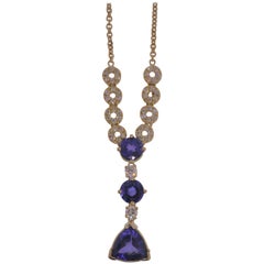 18 Karat Yellow Gold, Tanzanite ‘6.11 Carat’ and Diamond ‘1.04 Carat’ Pendant