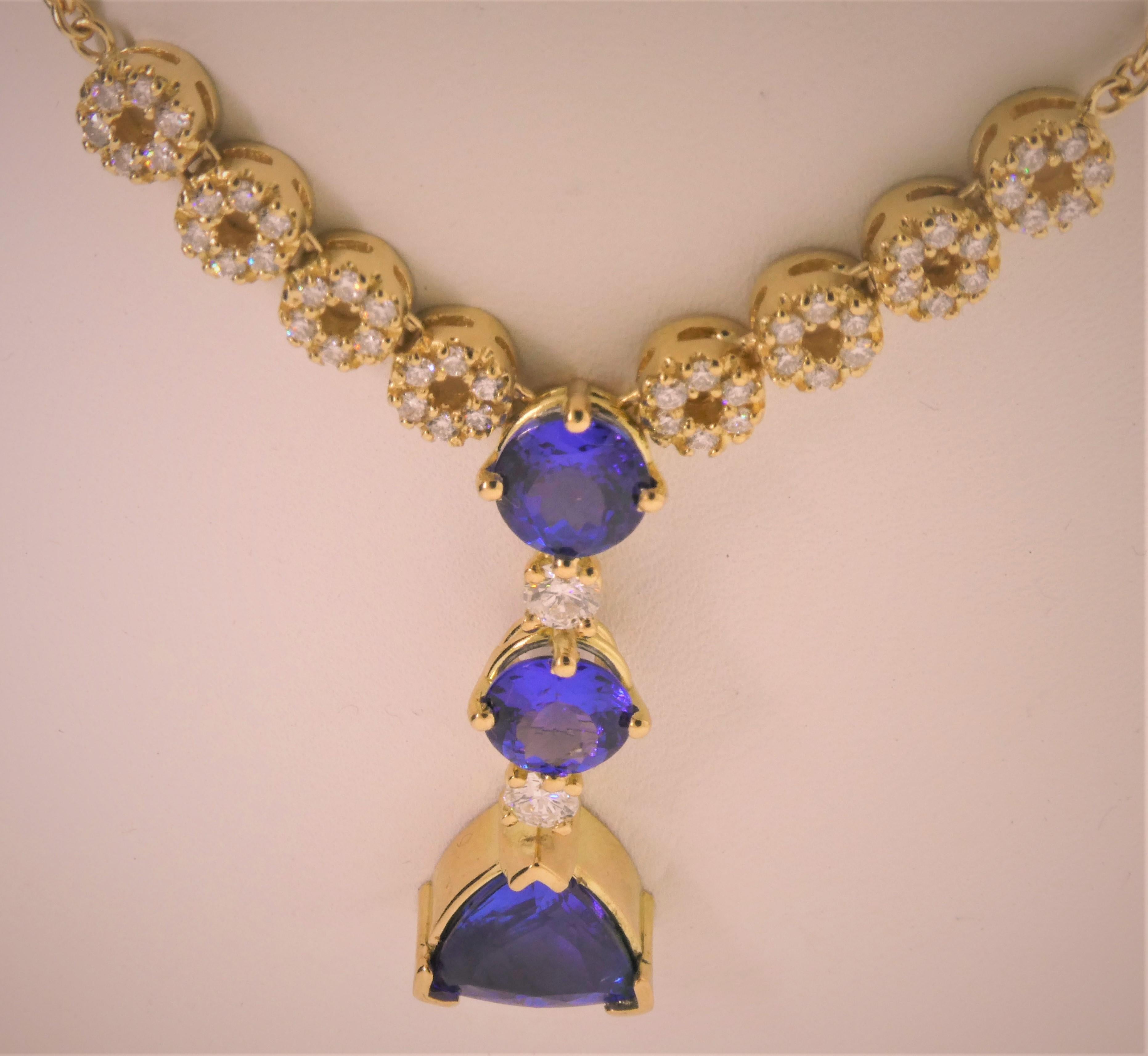 Contemporary 18 Karat Yellow Gold, Tanzanite ‘6.11 Carat’ and Diamond ‘1.04 Carat’ Pendant For Sale