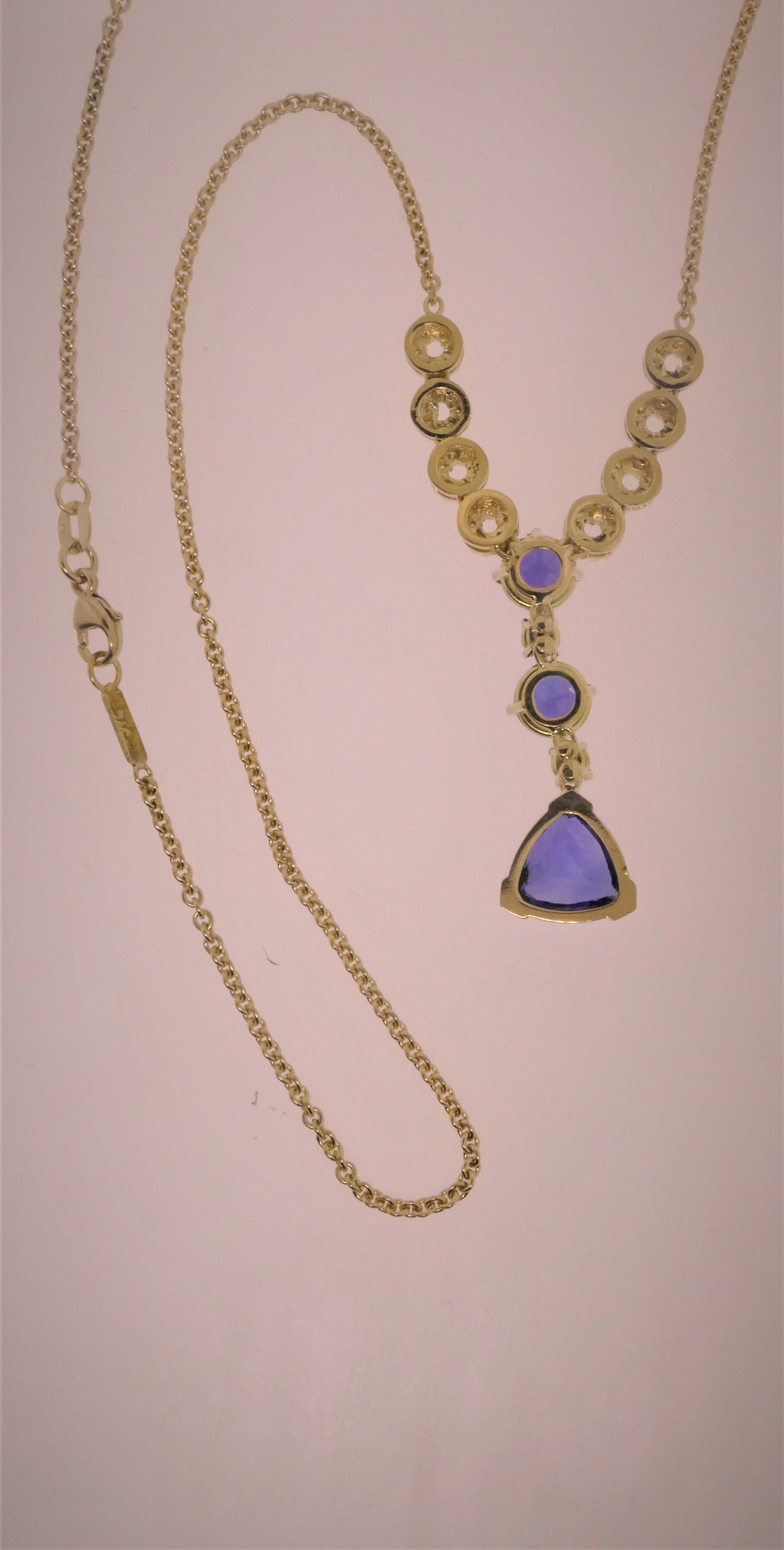 Women's or Men's 18 Karat Yellow Gold, Tanzanite ‘6.11 Carat’ and Diamond ‘1.04 Carat’ Pendant For Sale