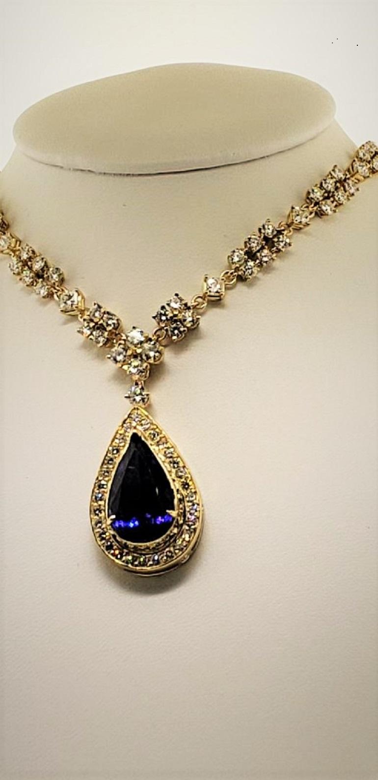 Contemporary 18 Karat Yellow Gold, Tanzanite '9.15 Carat' and Diamond '14.16 Carat' Necklace For Sale