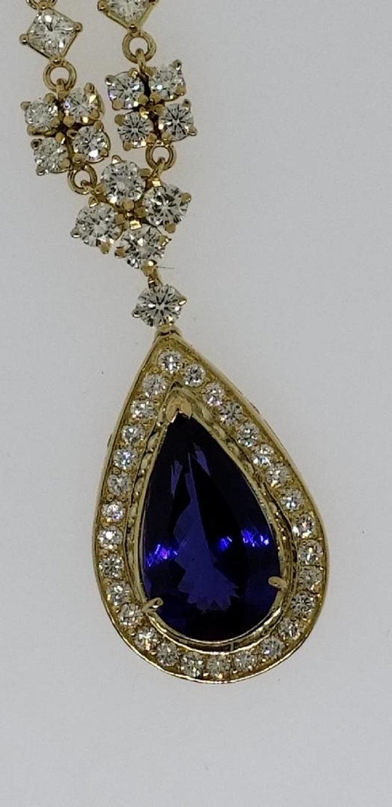 Pear Cut 18 Karat Yellow Gold, Tanzanite '9.15 Carat' and Diamond '14.16 Carat' Necklace For Sale
