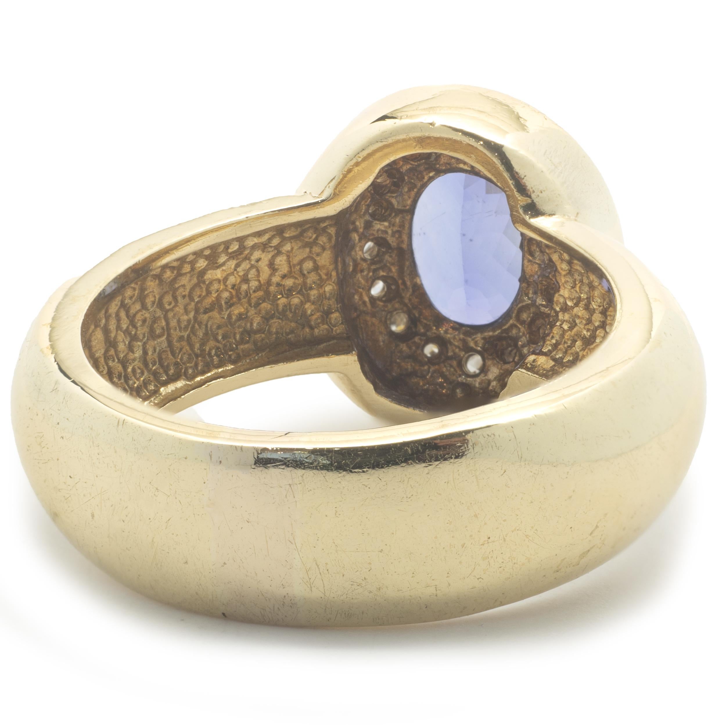 Round Cut 18 Karat Yellow Gold Tanzanite and Diamond Ring For Sale