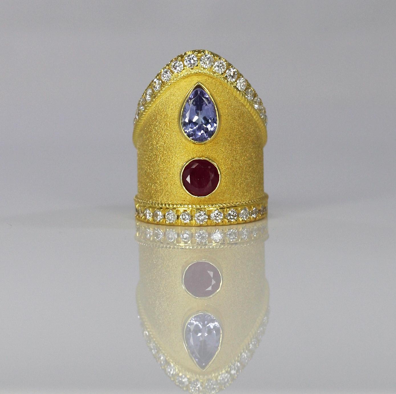 S.Georgios designer 18 Karat Yellow Gold Ring all handmade with the Byzantine workmanship and the unique velvet look on the background. The ring has rims decorated with White Diamonds total weight of 1.10 Carat and the center features 1.65 Carat
