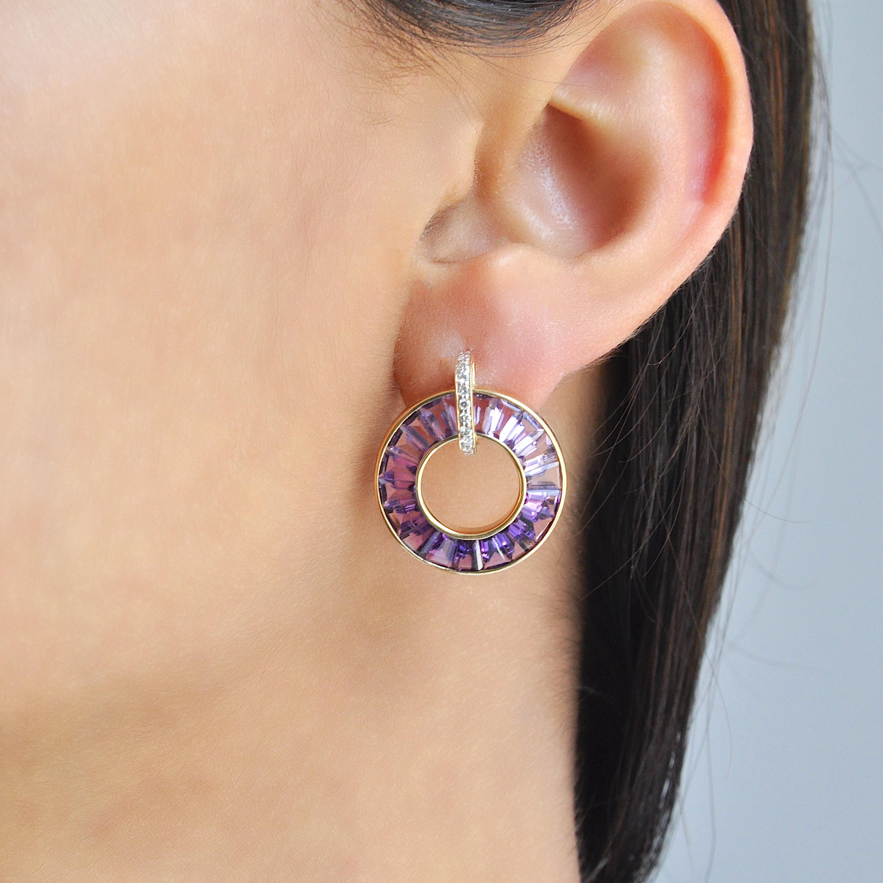 14 karat rose gold tapered baguettes amethyst diamond circle earrings.

Indulge in the timeless elegance of our 14K Gold Amethyst Diamond Circle Earrings. Crafted with meticulous precision, these earrings feature a mesmerizing circle arrangement of