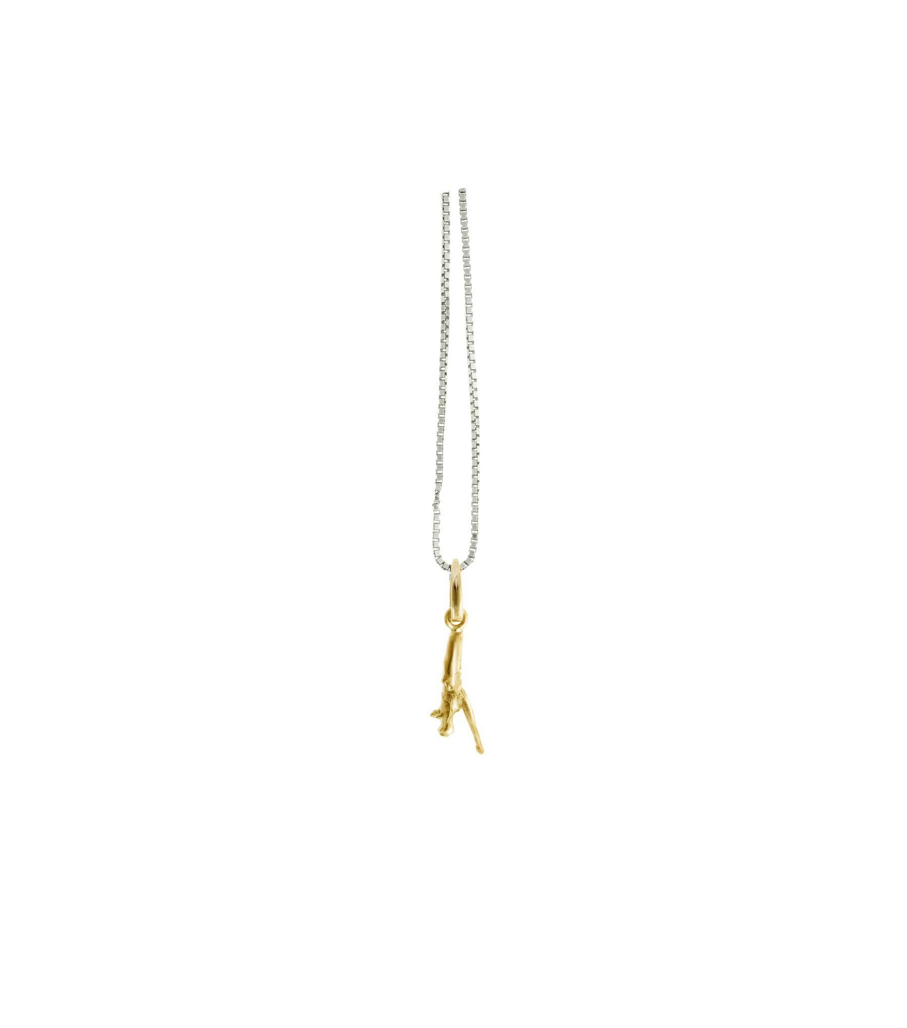 This 18 karat yellow gold Tea twig Chainka Sculptural pendant is the jewellery by artist piece, which opens the collection of “tiny pieces”. This delicate shape has been discovered during a tea ceremony when one little young leaf of tea came into an