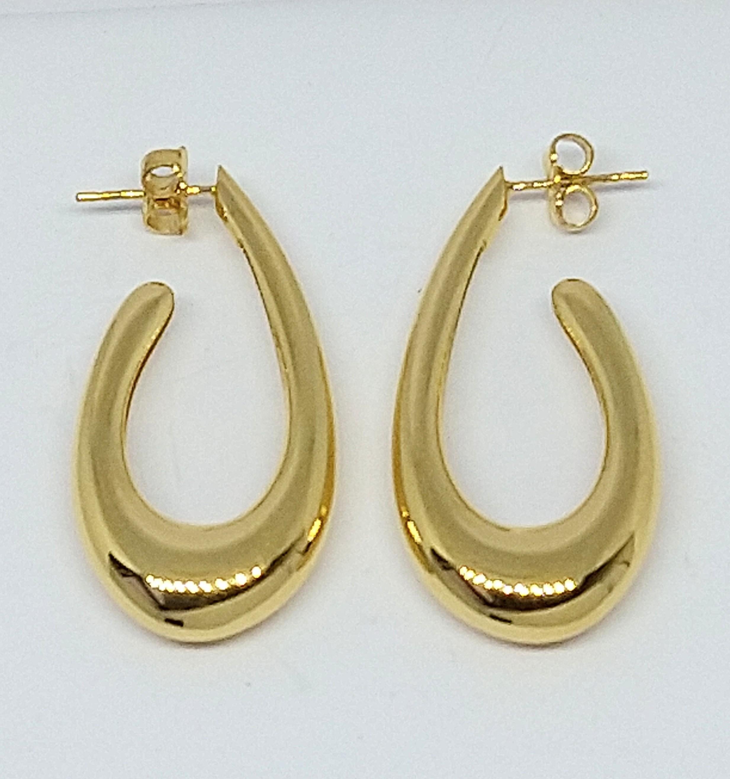18 Karat Yellow Gold Teardrop Hollow Hoop Earring,  1 5/16 inch high x 5/8 inch wide. From the Teardrop Series. Inspired from Jean Arp, the French sculptor. From his clean ,soft sexy lines in his sculptures.  Though the times we live in may get us