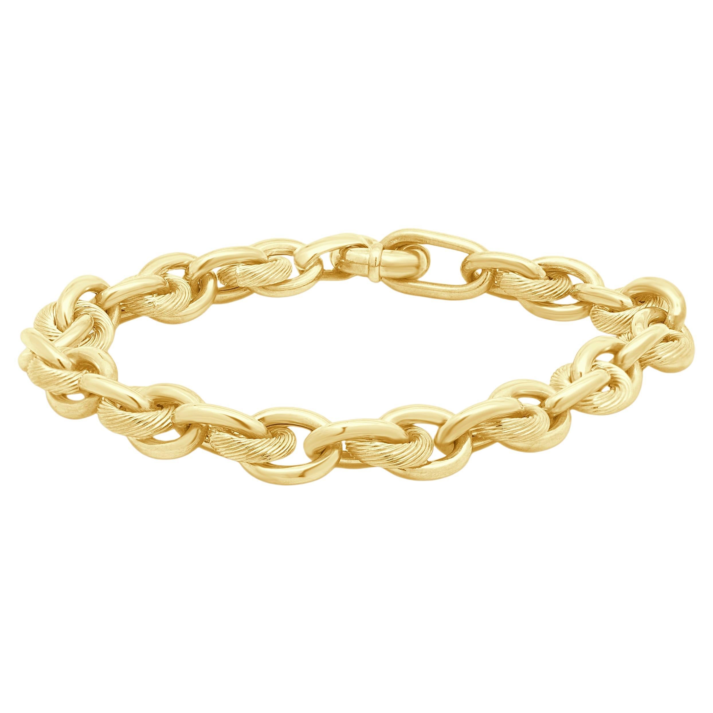 18 Karat Yellow Gold Textured Oval Interlocking Bracelet en venta