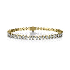 Bracelet tennis à trois griffes en or jaune 18 carats et diamants de 5 carats