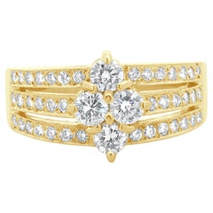 Anillo de oro amarillo de 18 quilates con racimo de tres filas de diamantes