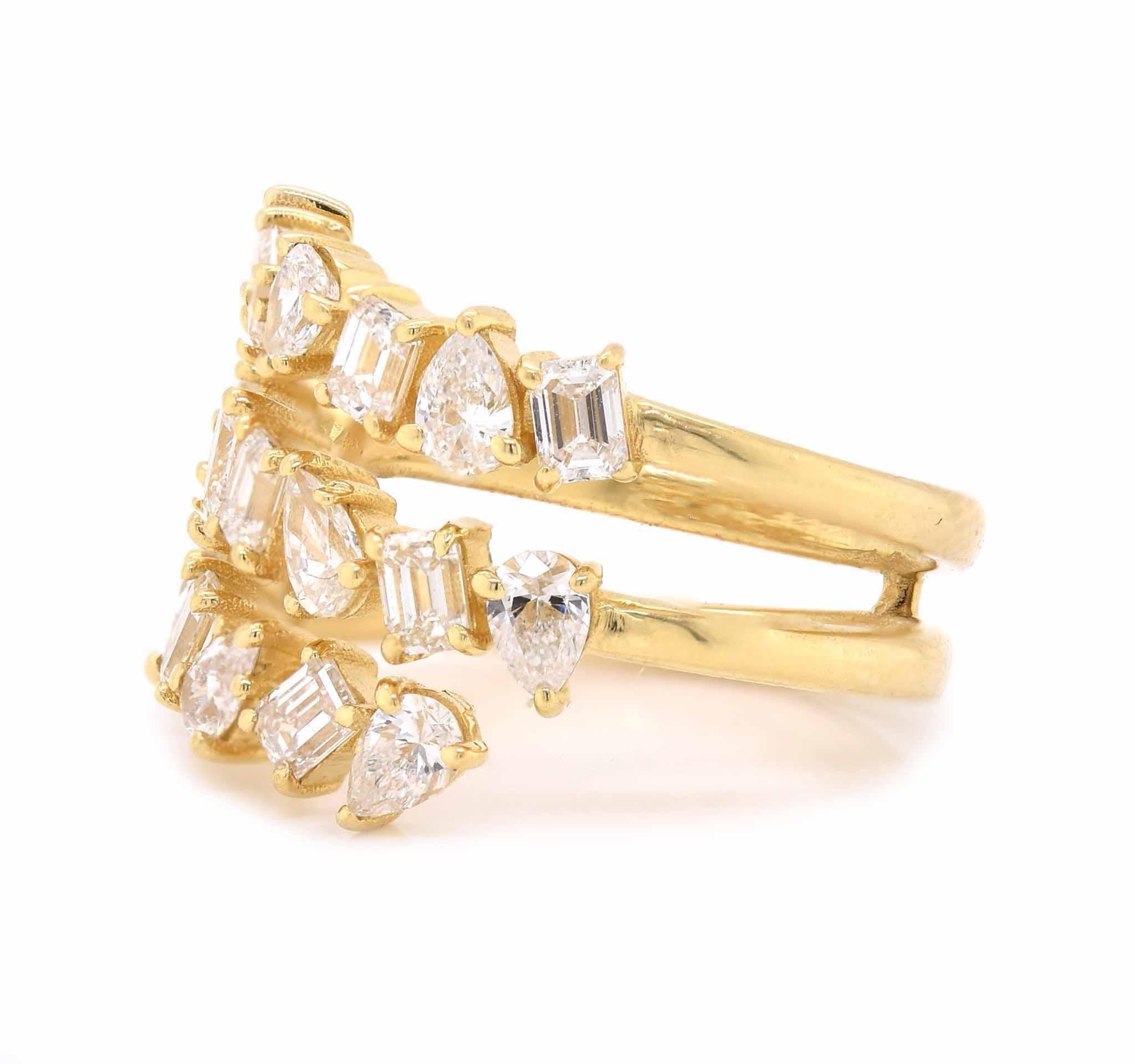 Designer: custom
Material: 18K yellow gold 
Diamonds: 9 baguette cut = 1.25cttw
Color: I
Clarity: VS2
Diamonds: 10 pear cut = 1.50cttw
Color: H/I
Clarity: VS2
Ring size: 6.75 (please allow two additional shipping days for sizing requests)
Weight: 