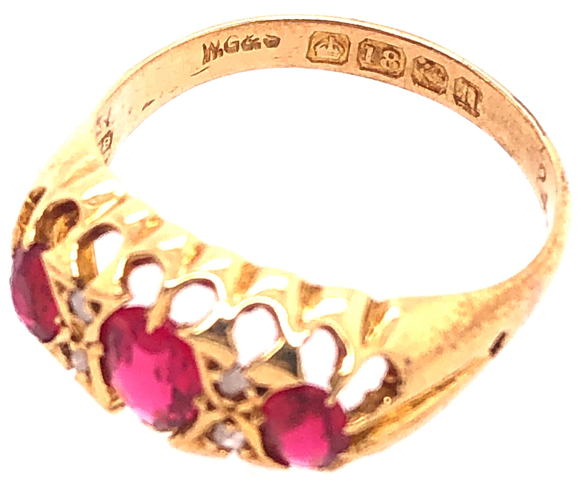 Modern 18 Karat Yellow Gold Three-Stone Ruby Ring Band with Diamond Accents For Sale