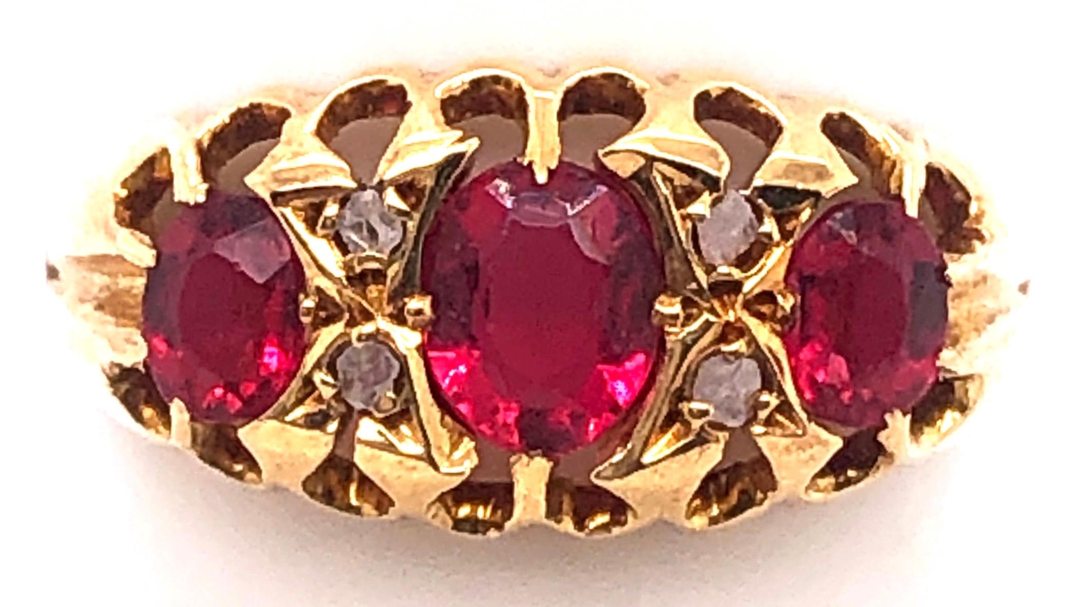 Women's or Men's 18 Karat Yellow Gold Three-Stone Ruby Ring Band with Diamond Accents For Sale