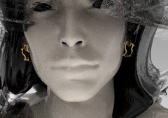 Eighteen Karat Yellow Gold Tibetan Drop Earrings with Green Emeralds