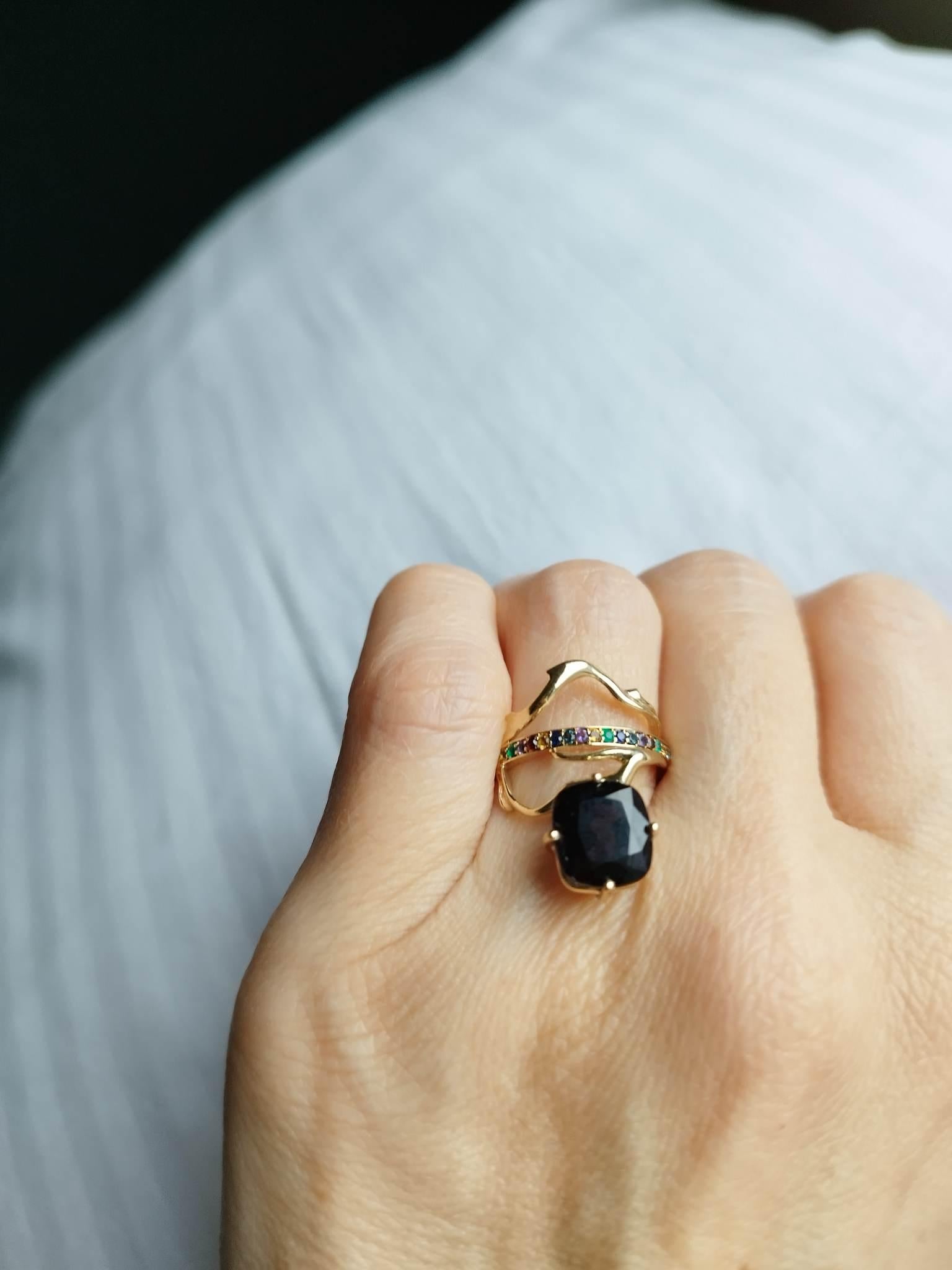 An unusual form makes this Tibetan 18 karat yellow gold contemporary dimensional ring an art object. It is encrusted with: colourful sapphires, diamonds, emeralds and cushion spinel (3-5 carats, dark purple or transparent lilac lavender up to your