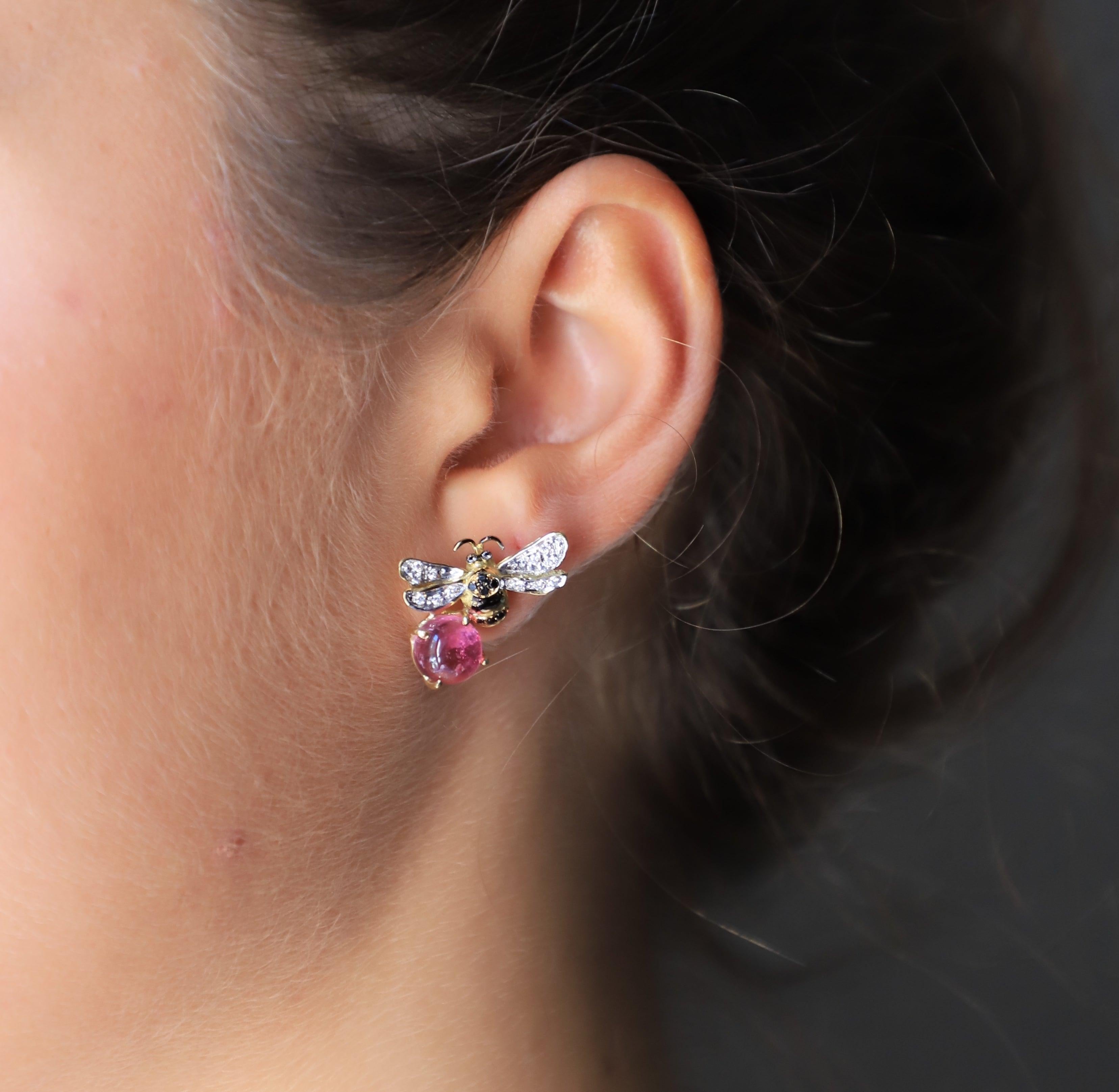 Rossella Ugolini Design Collection, a pair of Big Bees Stud Earrings handcrafted in 18 Karat Yellow Gold 5.5 Karat Pink& Green Tourmaline 0.16 Karat White Diamond 0.18 Karat Black Diamonds 
The two different colors of pink and green tourmalines make