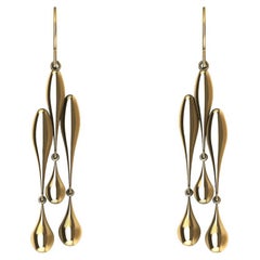 Pendientes Huecos Tri Gota de Agua de Oro Amarillo de 18 Kilates