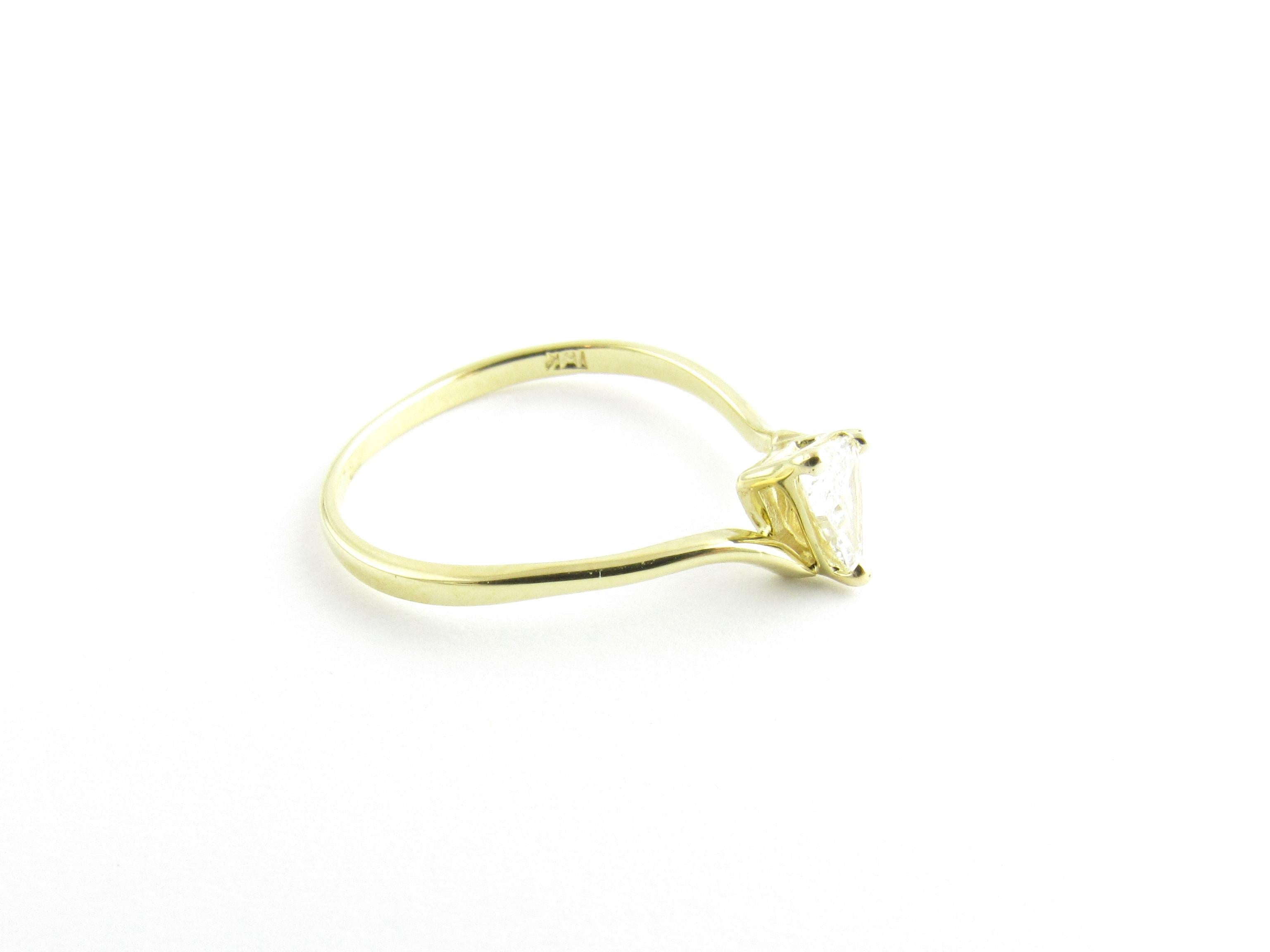 18 Karat Yellow Gold Trillion Diamond Ring 1