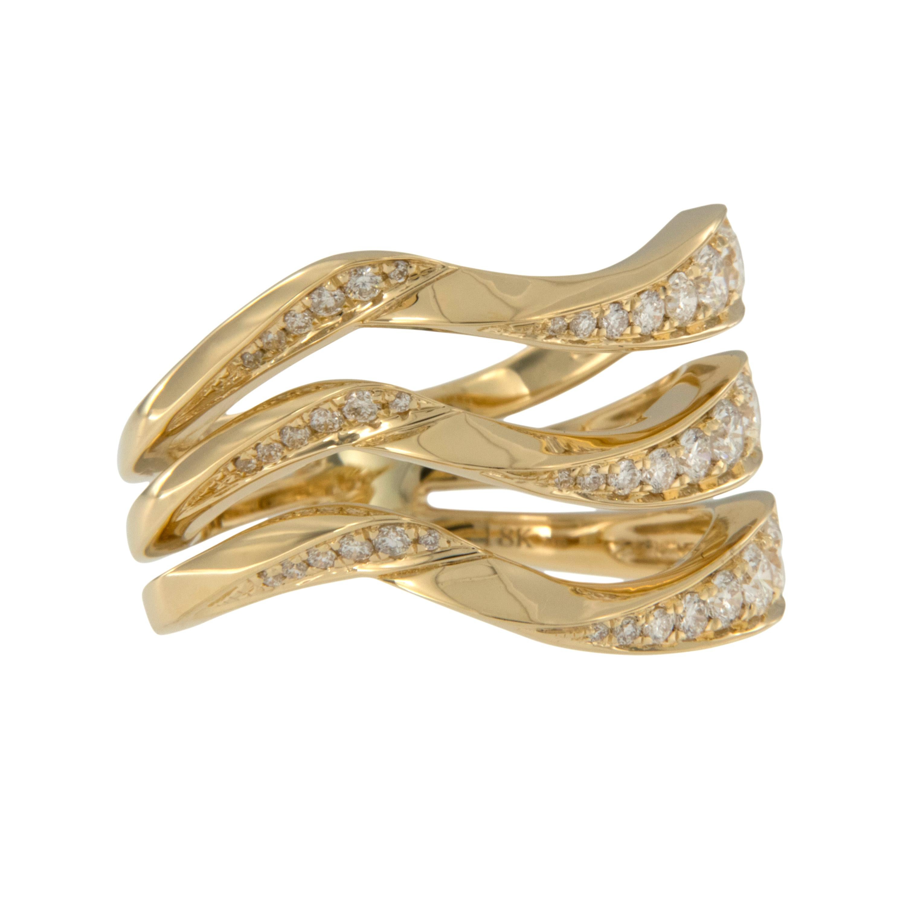 This fun & catching fashion ring with contemporary twist is a must have! Made from royal 18 karat yellow gold with 0.62 Cttw fine diamonds set on a bias shimmers in a size 6, but can be sized. Makes a perfect gift! Complimentary signature wrapping &