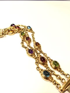 18 Karat Yellow Gold Triple-Stand Bracelet with Eleven Multicolored Tourmalines