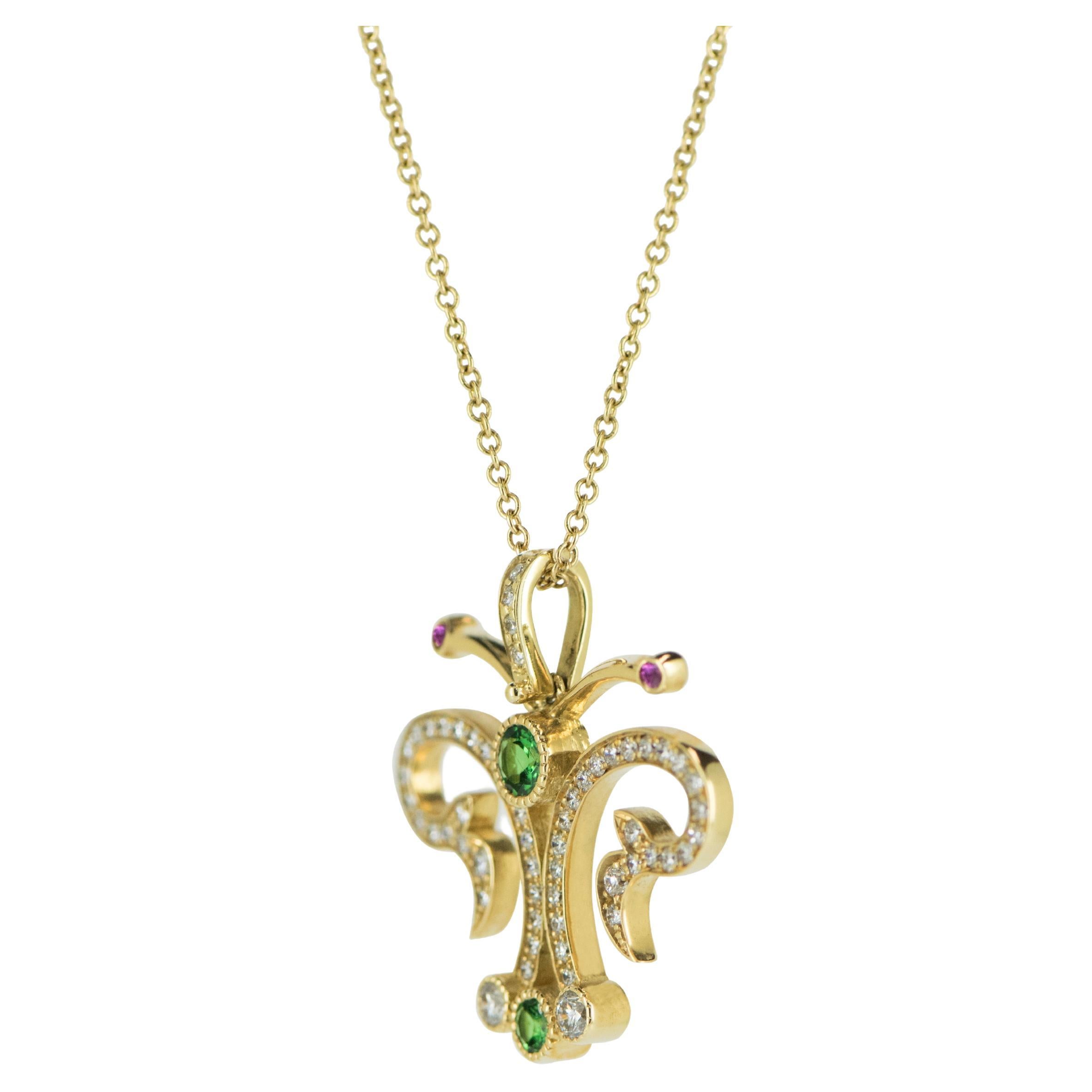 This 18 Karat Yellow Gold Tsavorite Butterfly Diamond Pendant is a mesmerizing piece of jewelry that will captivate any onlooker. The pendant features .90ct of sparkling diamonds, .87ct of vivid Tsavorite Garnets, and a touch of rubies, all expertly
